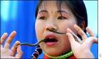 girl_with_snake_out_nose.jpg